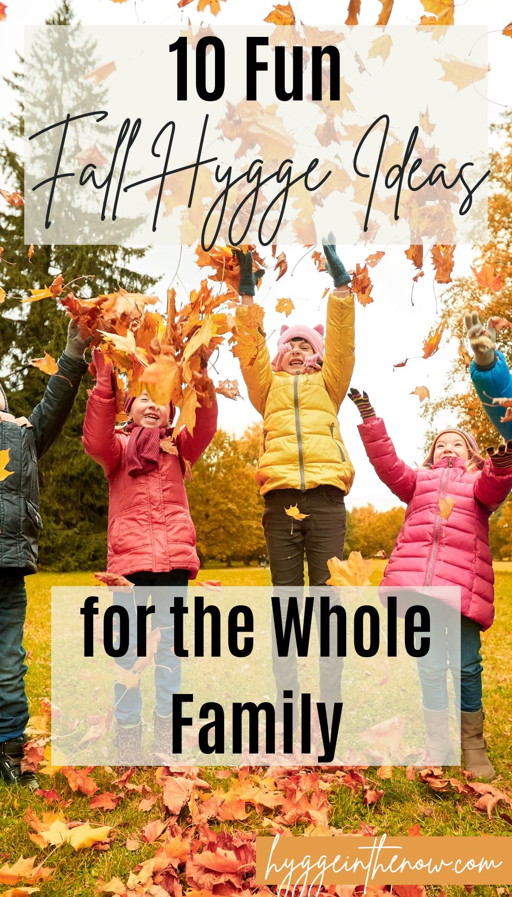 kids throwing fall leaves in the air